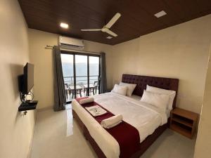 Postel nebo postele na pokoji v ubytování Trattino Resort + 67 fotografií