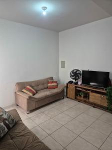 TV a/nebo společenská místnost v ubytování Apartamento sonho meu
