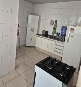 Kuchyň nebo kuchyňský kout v ubytování Apartamento sonho meu