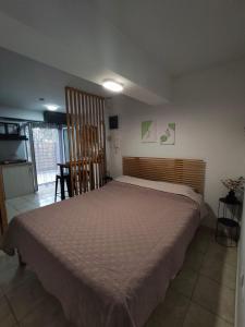 Cama ou camas em um quarto em Blue Lagoon Studio