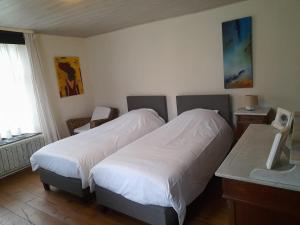 Postel nebo postele na pokoji v ubytování Lin-La-Bedin