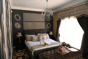 Postel nebo postele na pokoji v ubytování Jinaguesthouse and design