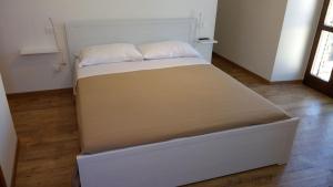 Postel nebo postele na pokoji v ubytování Camere Calocci