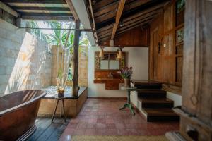 Kuchyň nebo kuchyňský kout v ubytování Villa Uma Priyayi