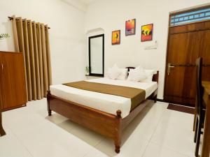 a bedroom with a bed in a room at Abheena - Weligama in Weligama +21 photos