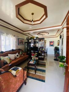 Χώρος καθιστικού στο Romar's Transient