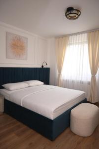 Ένα ή περισσότερα κρεβάτια σε δωμάτιο στο Mas Motel +2 φωτογραφίες