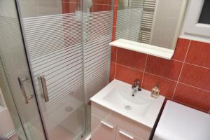 Kúpeľňa v ubytovaní Apartmani Vedmar