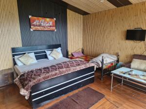 Postel nebo postele na pokoji v ubytování Wild Way Resort