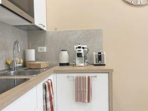 Kuchyň nebo kuchyňský kout v ubytování La Residenza di Giulia