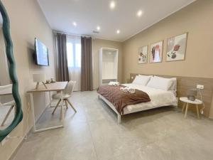 Postel nebo postele na pokoji v ubytování La Residenza di Giulia