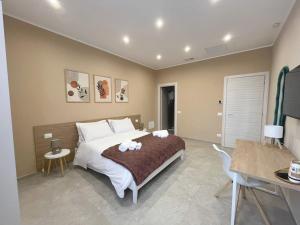 Postel nebo postele na pokoji v ubytování La Residenza di Giulia + 12 fotografií