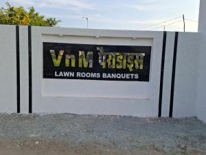 a sign for a lynx rooms banquets at VnM Paradise in Chunār +12 photos