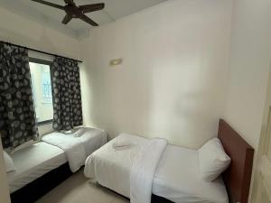 Giường trong phòng chung tại 21Homestay Imago +7 ảnh