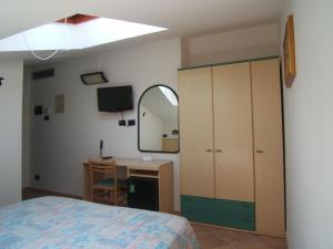 Postel nebo postele na pokoji v ubytování Hotel Prestige