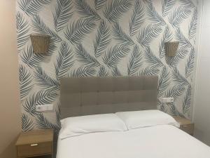 Postel nebo postele na pokoji v ubytování El Helecho de Gredos