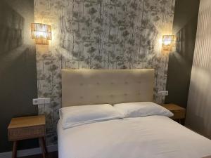 Postel nebo postele na pokoji v ubytování El Helecho de Gredos