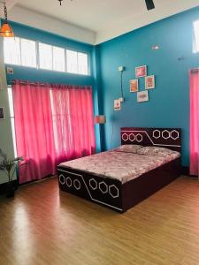 Ένα ή περισσότερα κρεβάτια σε δωμάτιο στο Destiny Home stay