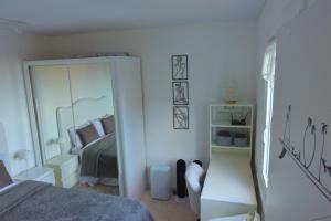 Postel nebo postele na pokoji v ubytování Casa da Vista Infinita