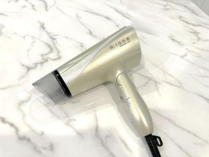 a hair dryer and a razor on a marble counter at Grandioso Onna 7-D - Vacation STAY 10524v in Atsutabaru