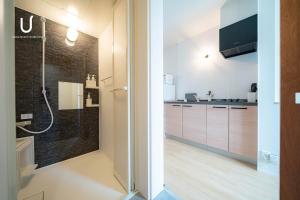 Kuchyň nebo kuchyňský kout v ubytování unito residence HAKATA Port 201