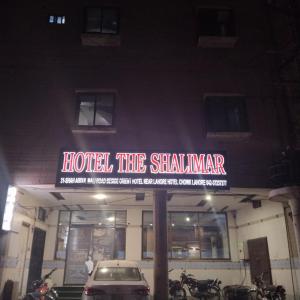 a sign that reads hotel the sharmarma on a building at Hotel The Shalimar in Lahore