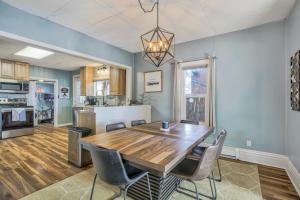 a kitchen and dining room with a wooden table and chairs at 109 W Golden in Cripple Creek