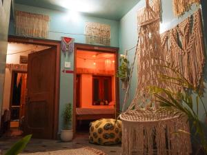 a room with a plant and a room with a door at Bohosthal guest house in Pushkar
