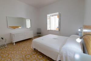 Giường trong phòng chung tại Casa Clarissa