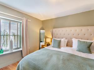 Postel nebo postele na pokoji v ubytování Autumn Cottage + 16 fotografií