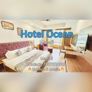 a poster of a hotel room with a bed at Dreamy Destiny Ocean in Manāli +15 photos