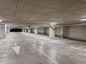 an empty parking lot in an empty parking garage at Apartments Ana in Maribor