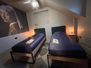 Ένα ή περισσότερα κρεβάτια σε δωμάτιο στο Traditional Narva House