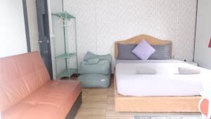 Katil atau katil-katil dalam bilik di Wings Alley Phuket