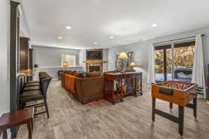 a living room with a couch and a table at 1144 Equinox in Colorado Springs