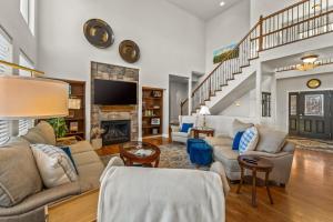 a living room filled with furniture and a fireplace at 1144 Equinox in Colorado Springs