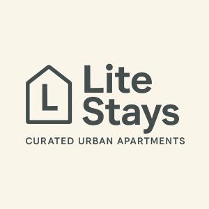a logo for the life stays quartered urban american apartments at Lite Stays - Powai in Mumbai