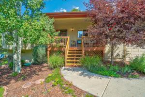 a home with a wooden deck with a porch at 120 Winding Meadow in Monument +32 photos