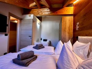 En eller flere senge i et værelse på Casa Franz