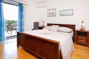 Giường trong phòng chung tại Villa Maja