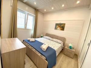 Postel nebo postele na pokoji v ubytování Villa Romolo a 150 mt dal mare + 101 fotografií