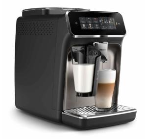 a black coffee maker with a cup of coffee at DeLuxe Apartments Piłsudskiego in Nowy Sącz