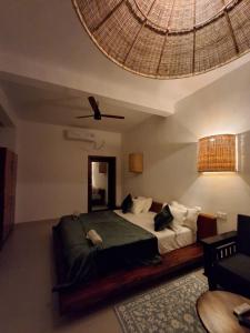 Postel nebo postele na pokoji v ubytování Shoonya - A Boutique Stay