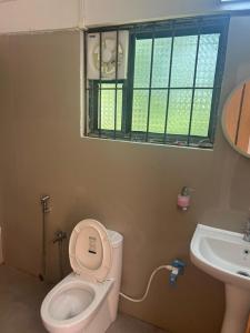 Ένα μπάνιο στο Majuli Backpackers Inn