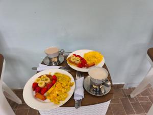a table with two plates of food on it at Chalet Gardel in San Francisco