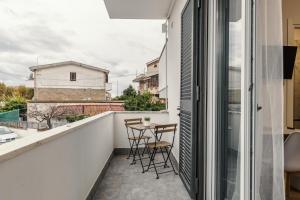 Balkón nebo terasa v ubytování Tury's House