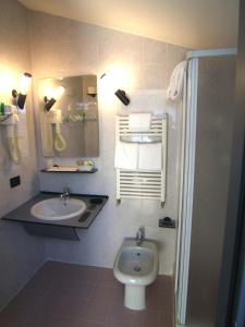 Koupelna v ubytování Hotel Prestige
