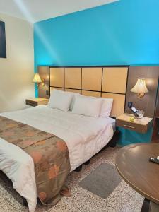 Postel nebo postele na pokoji v ubytování Hotel Manta Real