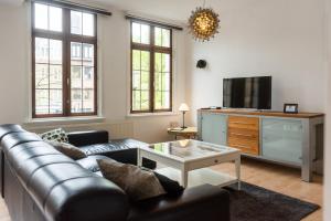 Μια τηλεόραση ή/και κέντρο ψυχαγωγίας στο Vrijdagmarkt Antwerpen