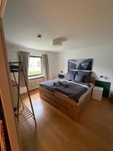 Postel nebo postele na pokoji v ubytování Ferienwohnung Urlaubskönner - Chiemgaukarte